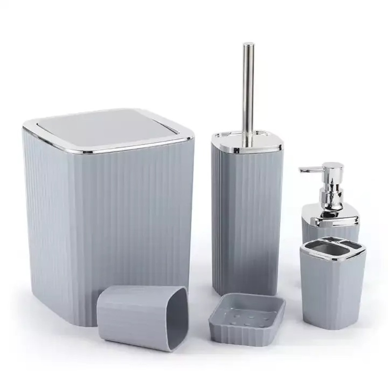 A set of plastic bathroom accessories