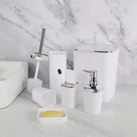 A set of plastic bathroom accessories